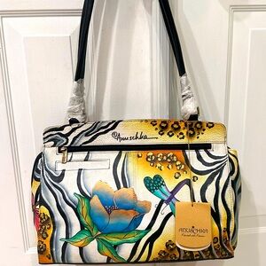 Brand new beautiful multi-color Anuschka handbag/purse!